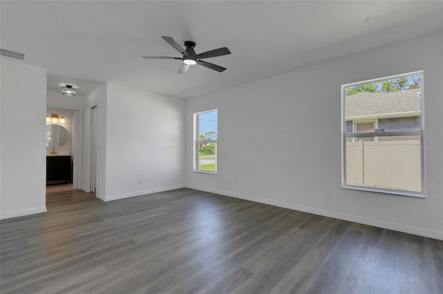 4957 N Cranberry Blvd, North Port, FL 34286 - unfurnished room with dark wood-style floors and ceiling fan