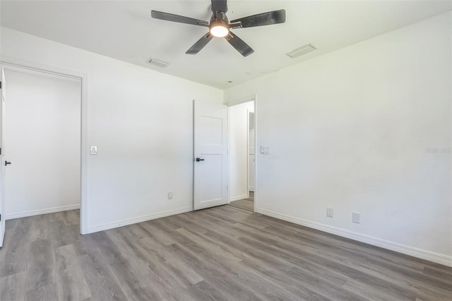 4957 N Cranberry Blvd, North Port, FL 34286 - unfurnished bedroom with wood finished floors and a ceiling fan
