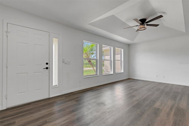 4957 N Cranberry Blvd, North Port, FL 34286 - entryway featuring dark wood-style flooring, ceiling fan, and a tray ceiling