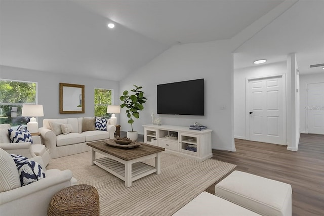 4957 N Cranberry Blvd, North Port, FL 34286 - living room with wood finished floors, plenty of natural light, lofted ceiling, and recessed lighting