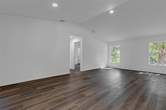 4957 N Cranberry Blvd, North Port, FL 34286 - spare room featuring vaulted ceiling, dark wood-style flooring, and recessed lighting