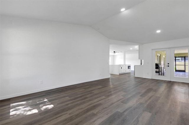 4957 N Cranberry Blvd, North Port, FL 34286 - unfurnished living room with french doors, lofted ceiling, dark wood-type flooring, and recessed lighting