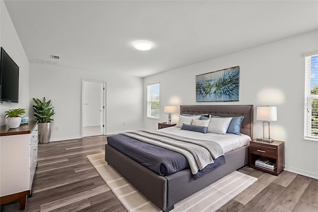 12124 Lake Blvd, Trinity, FL 34655 - bedroom featuring wood finished floors and baseboards