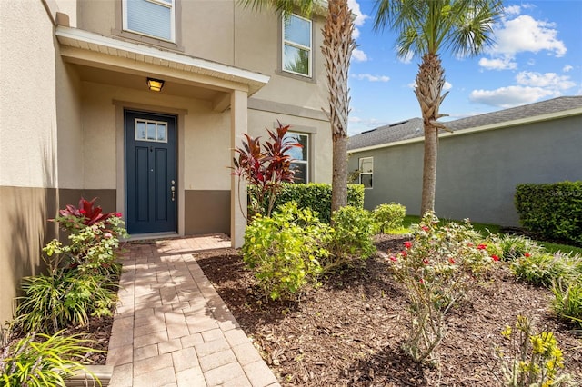 12124 Lake Blvd, Trinity, FL 34655 - entrance to property featuring stucco siding