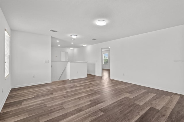 12124 Lake Blvd, Trinity, FL 34655 - empty room featuring wood finished floors and baseboards