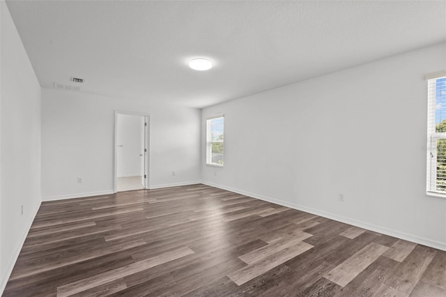 12124 Lake Blvd, Trinity, FL 34655 - unfurnished room featuring dark wood-style floors