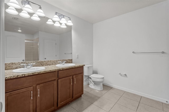 12124 Lake Blvd, Trinity, FL 34655 - bathroom with double vanity, a stall shower, and tile patterned floors