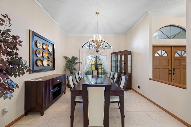 1304 N Jasmine Ave, Tarpon Springs, FL 34689 - dining space with a chandelier, light tile patterned floors, and crown molding