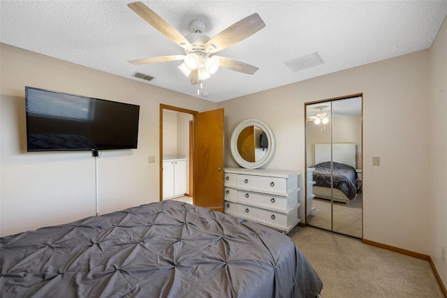 1304 N Jasmine Ave, Tarpon Springs, FL 34689 - bedroom featuring light colored carpet, a closet, and a ceiling fan