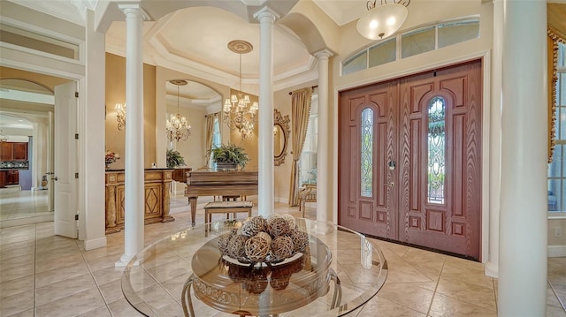 15110 Sundial Pl, Lakewood Ranch, FL 34202 - foyer with ornate columns, ornamental molding, and a chandelier