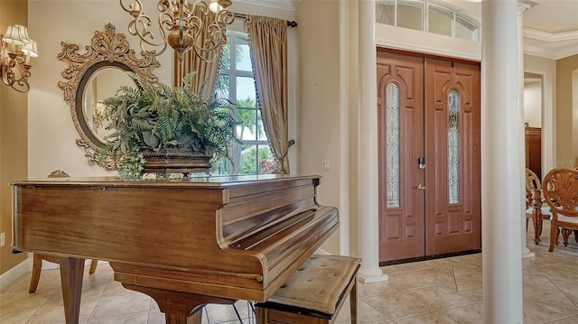 15110 Sundial Pl, Lakewood Ranch, FL 34202 - entryway with ornamental molding, a chandelier, and decorative columns