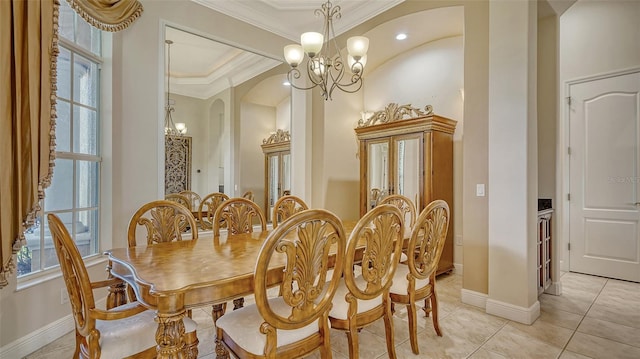 15110 Sundial Pl, Lakewood Ranch, FL 34202 - dining space with a chandelier, plenty of natural light, crown molding, and arched walkways