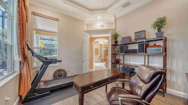 15110 Sundial Pl, Lakewood Ranch, FL 34202 - office space with arched walkways, wood finished floors, ornamental molding, and a tray ceiling