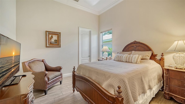 15110 Sundial Pl, Lakewood Ranch, FL 34202 - bedroom with crown molding and light wood finished floors