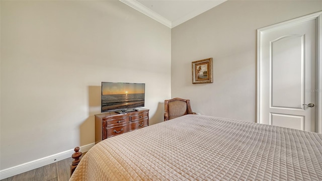 15110 Sundial Pl, Lakewood Ranch, FL 34202 - bedroom with ornamental molding and wood finished floors