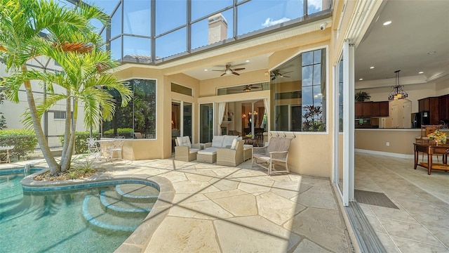 15110 Sundial Pl, Lakewood Ranch, FL 34202 - view of patio / terrace featuring a ceiling fan, an outdoor pool, and glass enclosure