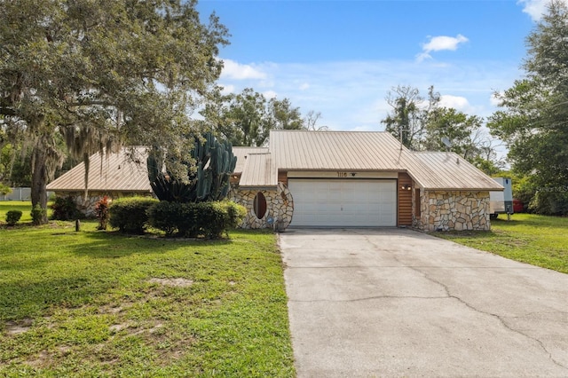 1116 Dagmar Ave, Spring Hill, FL 34606 - mid-century home with stone siding, a garage, concrete driveway, and a front yard