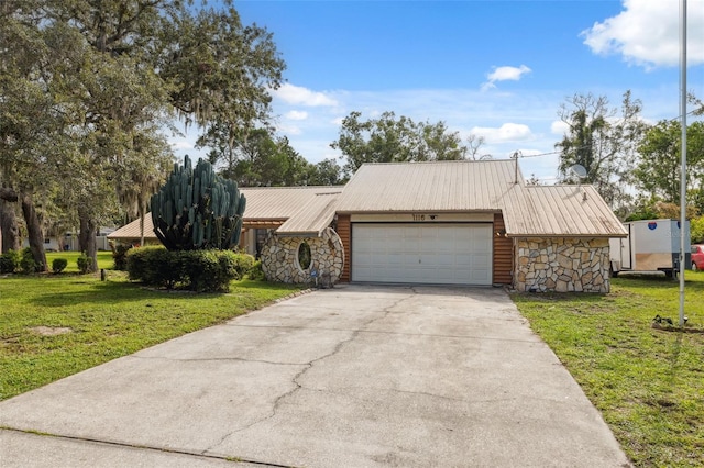 1116 Dagmar Ave, Spring Hill, FL 34606 - mid-century home featuring stone siding, a front lawn, a garage, and driveway