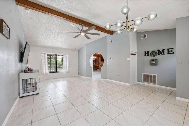 1116 Dagmar Ave, Spring Hill, FL 34606 - unfurnished living room with arched walkways, a textured ceiling, a ceiling fan, light tile patterned floors, and a chandelier