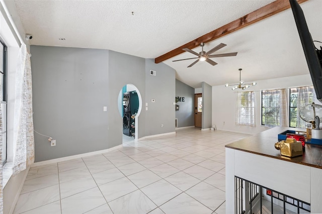 1116 Dagmar Ave, Spring Hill, FL 34606 - living area featuring ceiling fan, arched walkways, a chandelier, and a textured ceiling