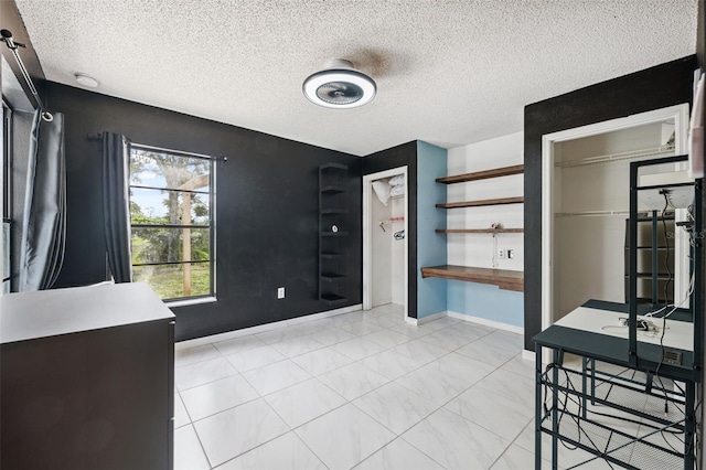 1116 Dagmar Ave, Spring Hill, FL 34606 - unfurnished dining area with a textured ceiling
