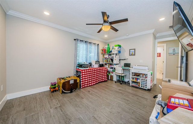 1120 Lancer Ln, Tarpon Springs, FL 34689 - game room with a ceiling fan, wood finished floors, recessed lighting, crown molding, and an office area