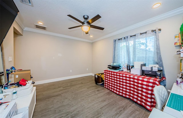1120 Lancer Ln, Tarpon Springs, FL 34689 - living area featuring wood finished floors, a ceiling fan, ornamental molding, and recessed lighting