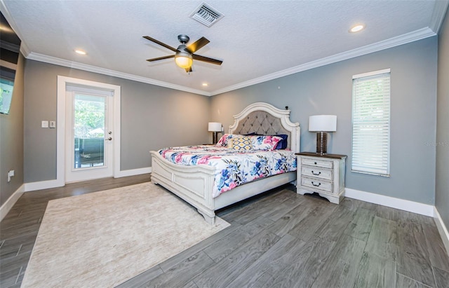 1120 Lancer Ln, Tarpon Springs, FL 34689 - bedroom featuring wood finished floors, recessed lighting, a ceiling fan, ornamental molding, and a textured ceiling