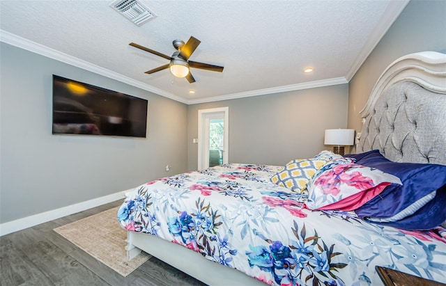 1120 Lancer Ln, Tarpon Springs, FL 34689 - bedroom with wood finished floors, recessed lighting, a ceiling fan, crown molding, and a textured ceiling