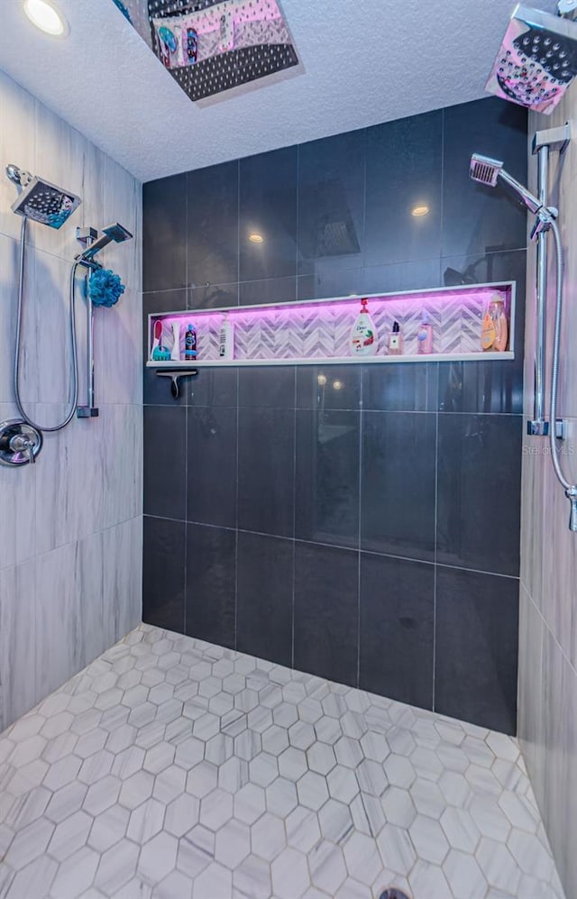 1120 Lancer Ln, Tarpon Springs, FL 34689 - full bathroom with a textured ceiling and a tile shower