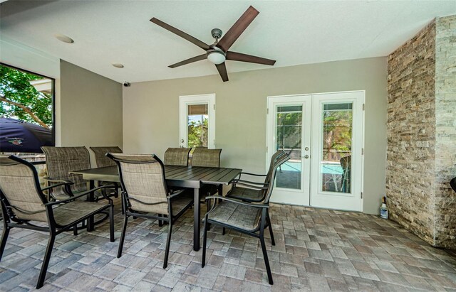 1120 Lancer Ln, Tarpon Springs, FL 34689 - view of patio featuring french doors and a ceiling fan
