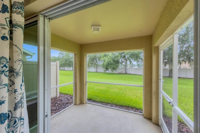 11571 84th Street Cir E Unit 106, Parrish, FL 34219 - unfurnished sunroom featuring plenty of natural light