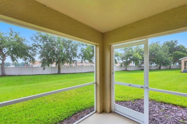 11571 84th Street Cir E Unit 106, Parrish, FL 34219 - unfurnished sunroom with healthy amount of natural light