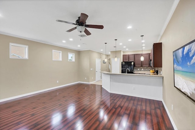 11571 84th Street Cir E Unit 106, Parrish, FL 34219 - unfurnished living room with ornamental molding, dark wood finished floors, recessed lighting, and ceiling fan
