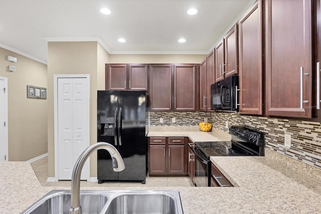 11571 84th Street Cir E Unit 106, Parrish, FL 34219 - kitchen featuring black appliances, ornamental molding, light countertops, tasteful backsplash, and recessed lighting