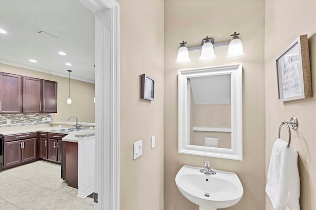 11571 84th Street Cir E Unit 106, Parrish, FL 34219 - bathroom with tasteful backsplash, tile patterned floors, and recessed lighting