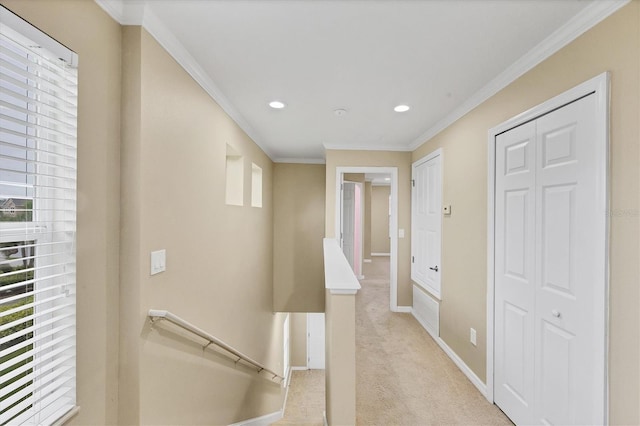 11571 84th Street Cir E Unit 106, Parrish, FL 34219 - hallway featuring an upstairs landing, healthy amount of natural light, ornamental molding, recessed lighting, and light colored carpet