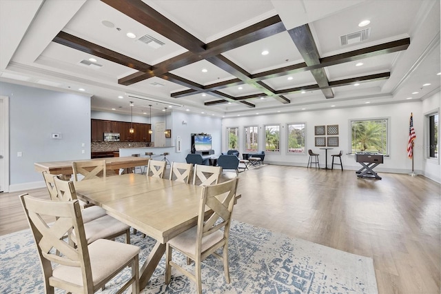 11571 84th Street Cir E Unit 106, Parrish, FL 34219 - dining space with light wood finished floors, beamed ceiling, coffered ceiling, and recessed lighting