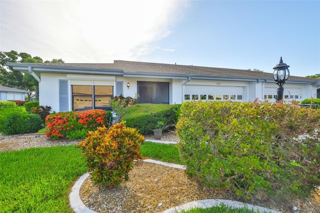 2510 Locksley St Unit 2510, Sun City Center, FL 33573 - ranch-style house with stucco siding and a garage