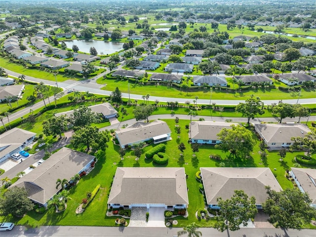 2510 Locksley St Unit 2510, Sun City Center, FL 33573 - aerial perspective of suburban area with a nearby body of water