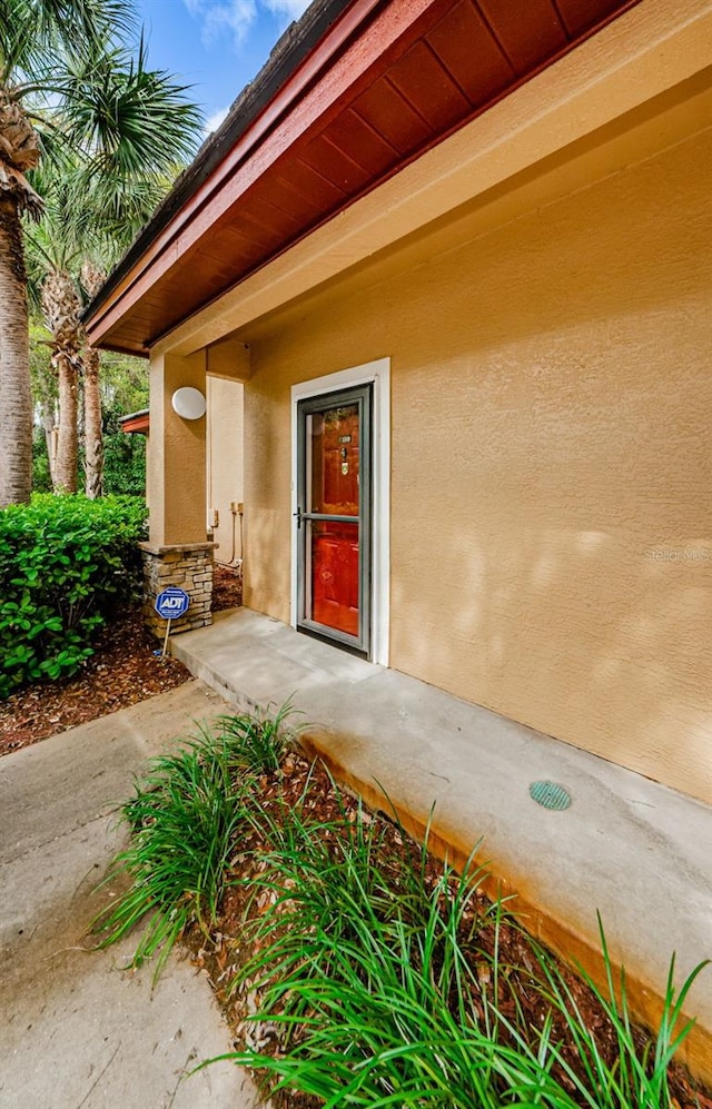 2148 Chianti Pl Unit 1310, Palm Harbor, FL 34683 - entrance to property featuring stucco siding