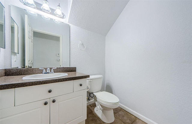 2148 Chianti Pl Unit 1310, Palm Harbor, FL 34683 - bathroom with a textured wall, vanity, and tile patterned floors