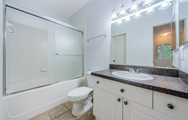 2148 Chianti Pl Unit 1310, Palm Harbor, FL 34683 - bathroom featuring vanity, tile patterned flooring, and enclosed tub / shower combo