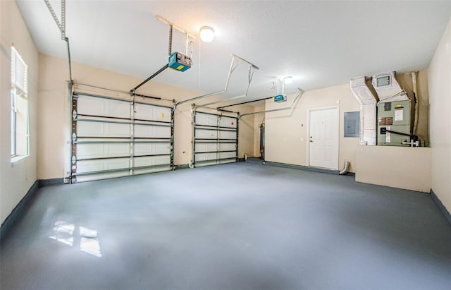 2148 Chianti Pl Unit 1310, Palm Harbor, FL 34683 - garage featuring electric panel, a garage door opener, and heating unit