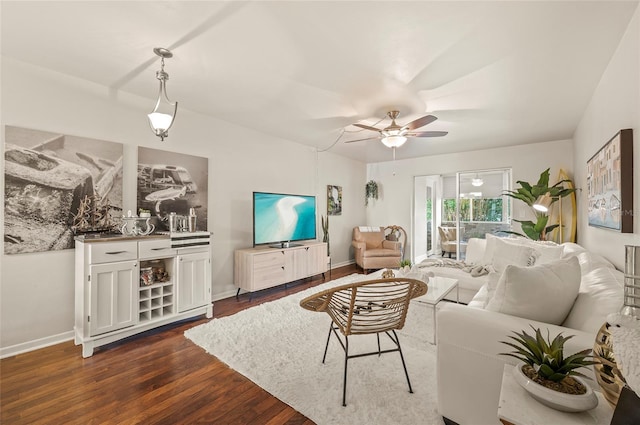 500 Glennes Ln Unit 206, Dunedin, FL 34698 - living room featuring ceiling fan and dark wood-type flooring