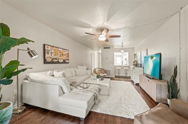 500 Glennes Ln Unit 206, Dunedin, FL 34698 - living room featuring a ceiling fan and dark wood-style flooring