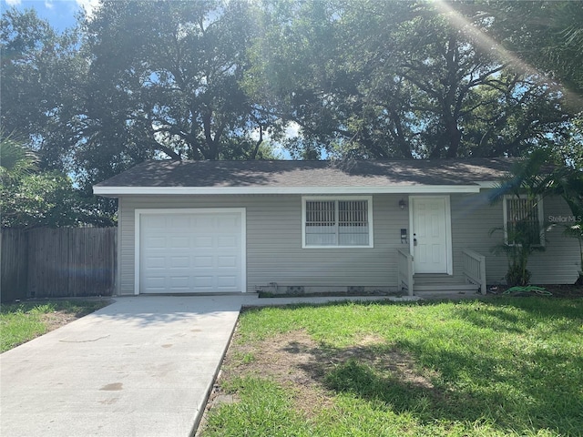 7236 65th Way N, Pinellas Park, FL 33781 - view of front of home featuring an attached garage and concrete driveway