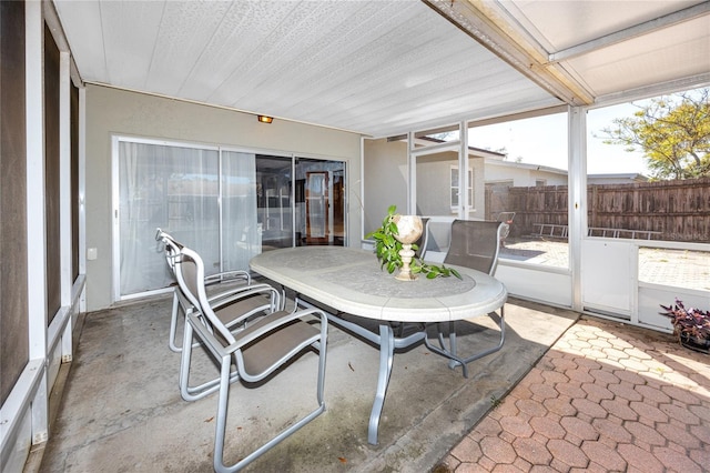849 Karen St, Palm Harbor, FL 34684 - sunroom with outdoor dining area