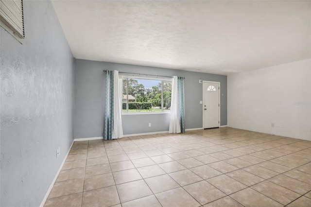 992 20th St SW, Largo, FL 33770 - empty room featuring light tile patterned flooring