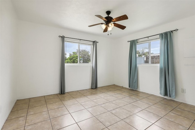 992 20th St SW, Largo, FL 33770 - empty room featuring healthy amount of natural light and ceiling fan